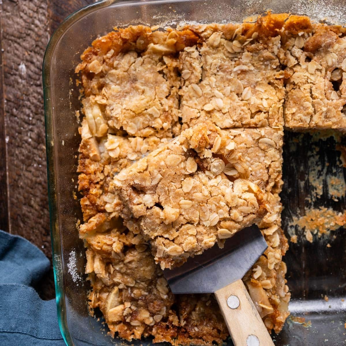 apple oat bars cut in a glass pan