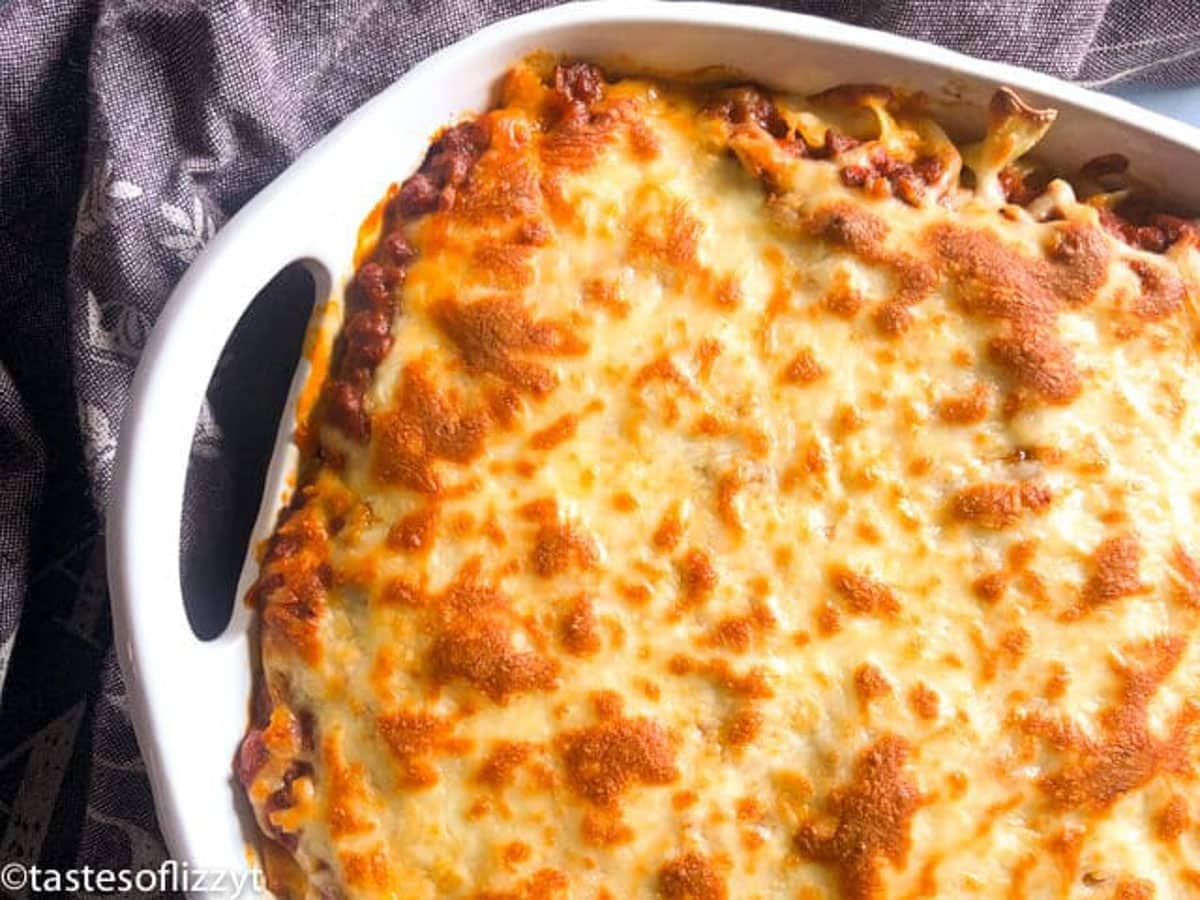 overhead view of cheesy lasagna casserole in a pan